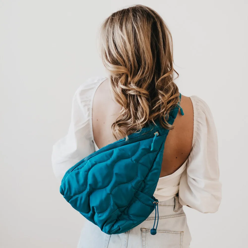 Striding Through Philly Puffer Sling Bag & Backpack